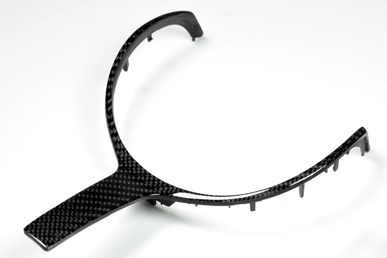 carbon fiber m sport trim on white background