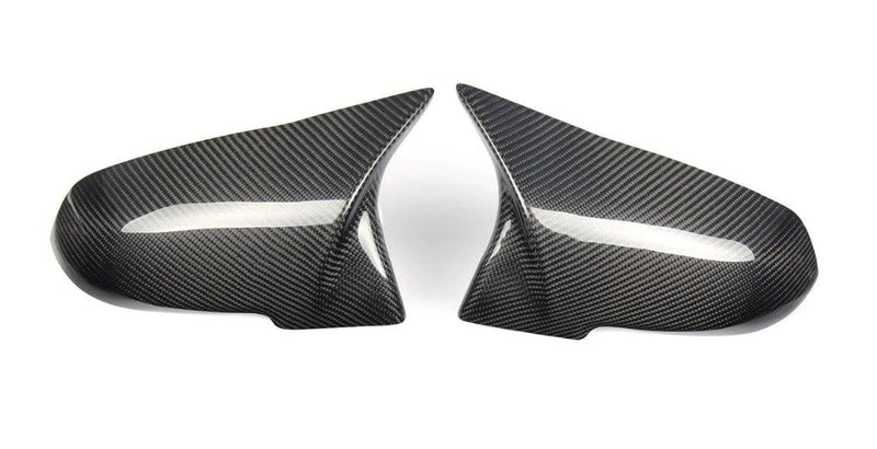 carbon fiber mirror caps on white background