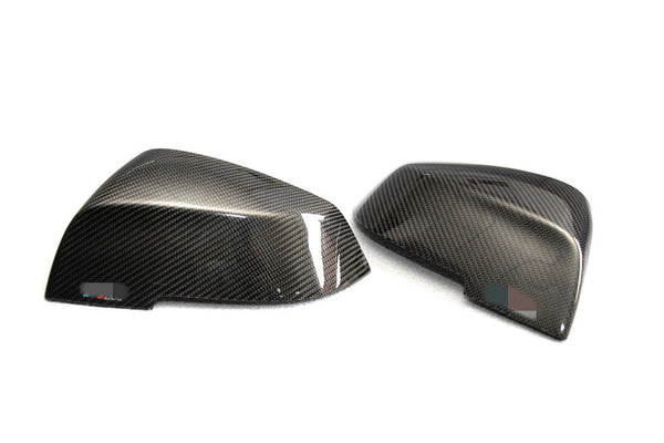 carbon fiber mirror caps for bmw on a white background
